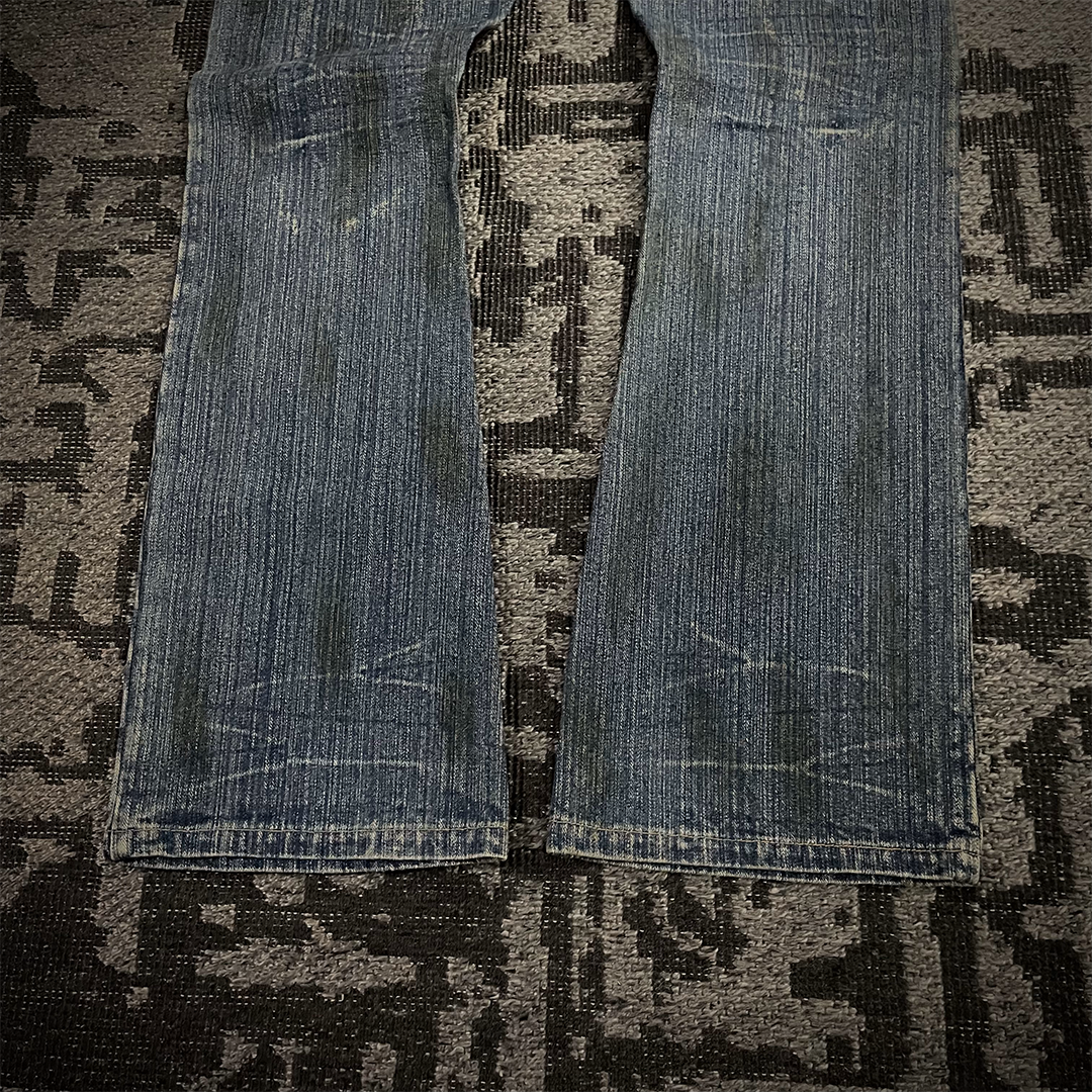 In The Attic Rare Distressed Dirty Flare Denim