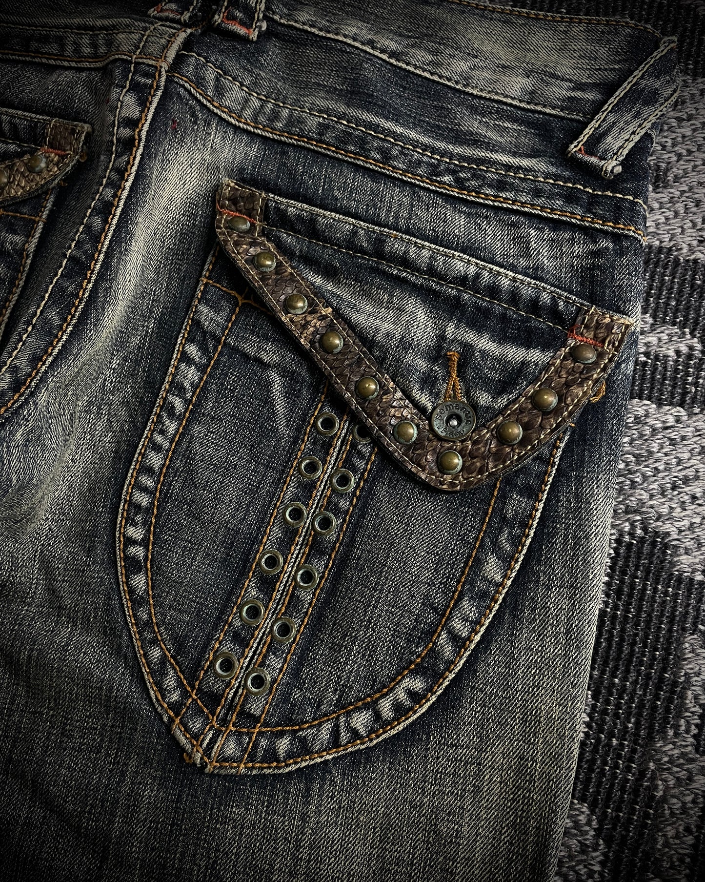 Semantic Design Python Studded Spiral Flared Jeans