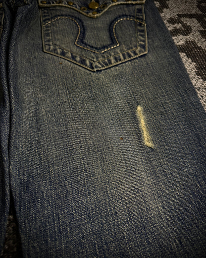 Tornado Mart Studded Distressed Flare Denim