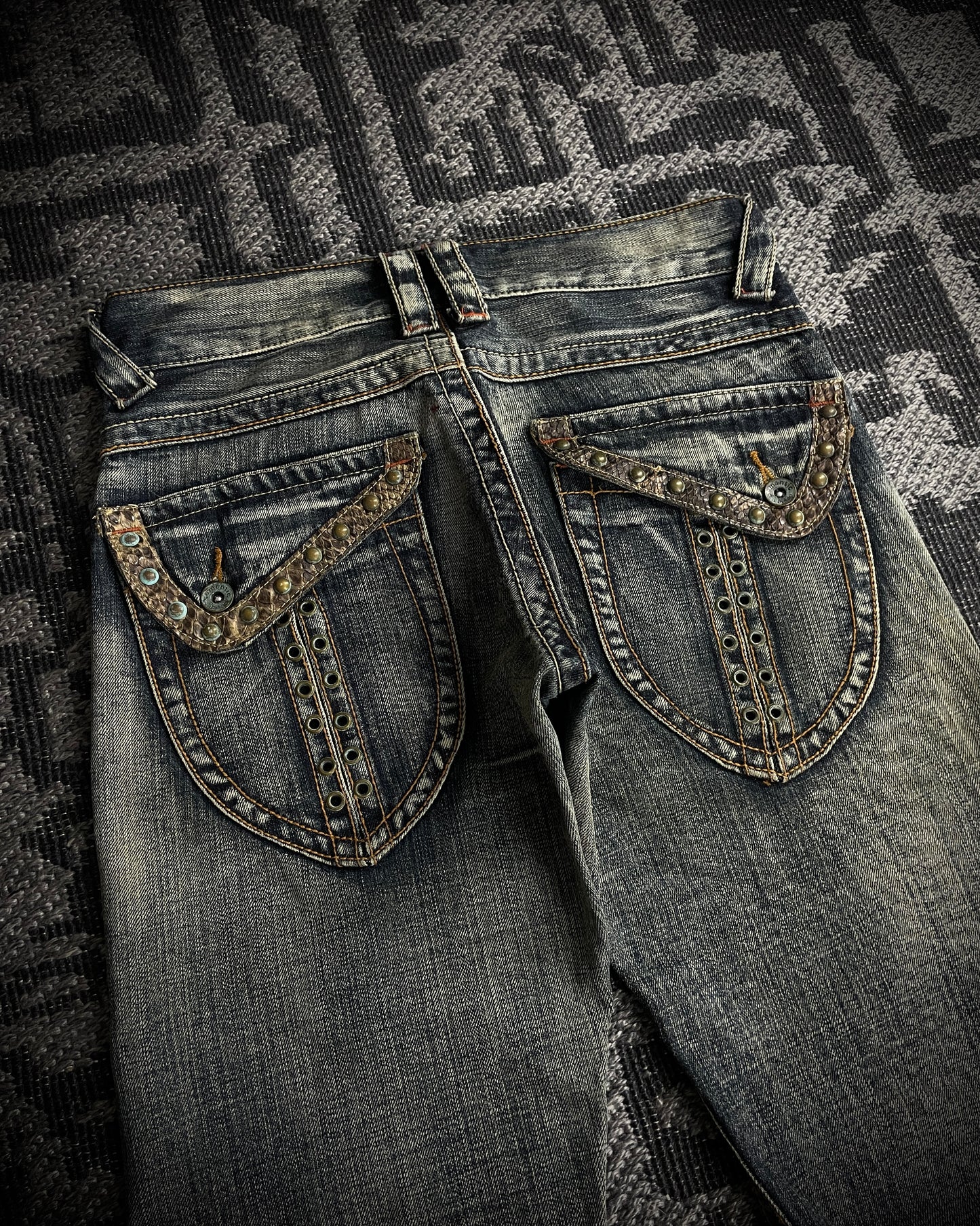 Semantic Design Python Studded Spiral Flared Jeans