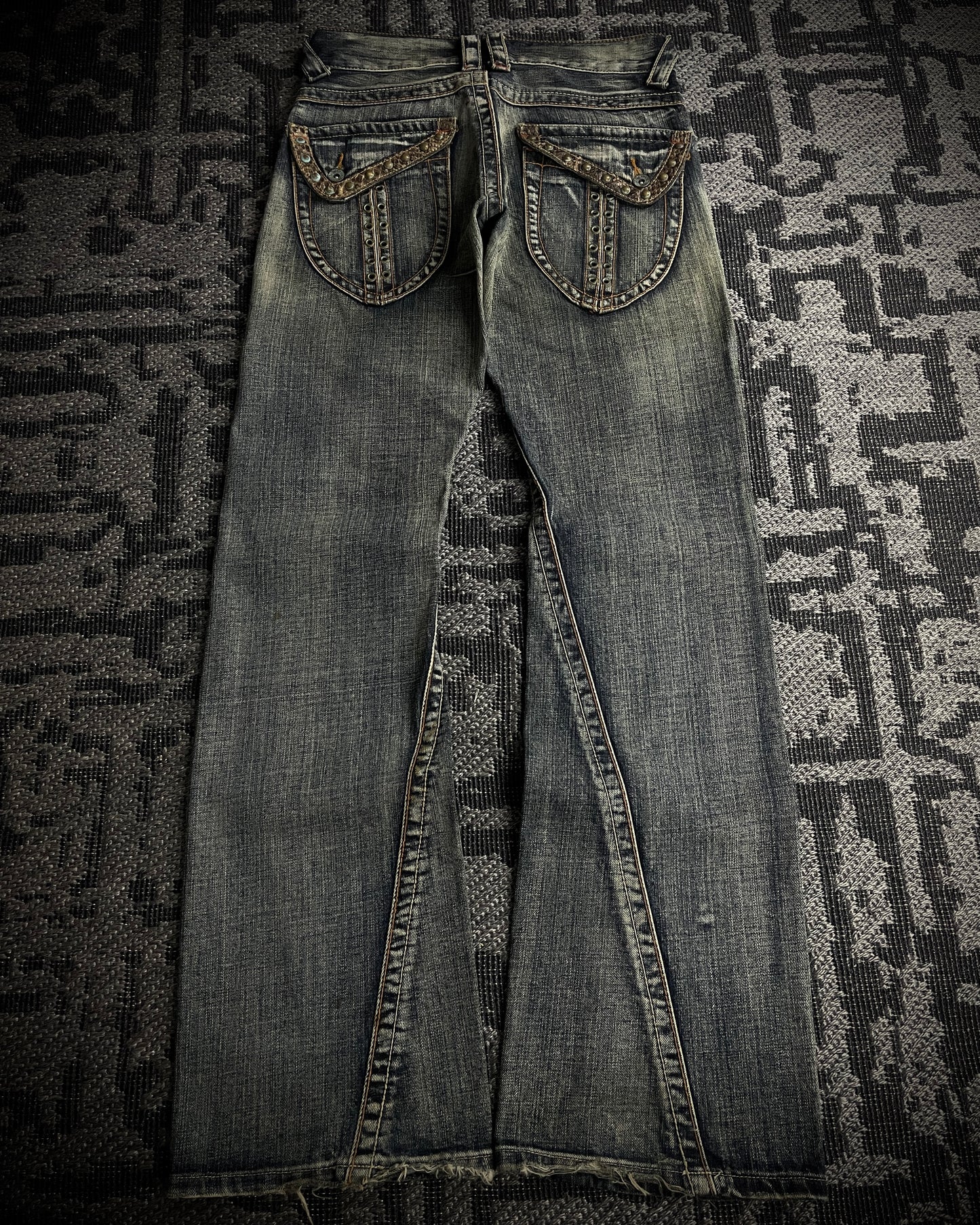 Semantic Design Python Studded Spiral Flared Jeans