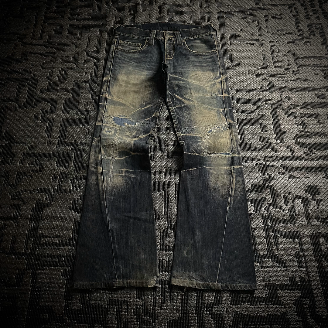 Tornado Mart Distressed Spiral Bootcut Denim