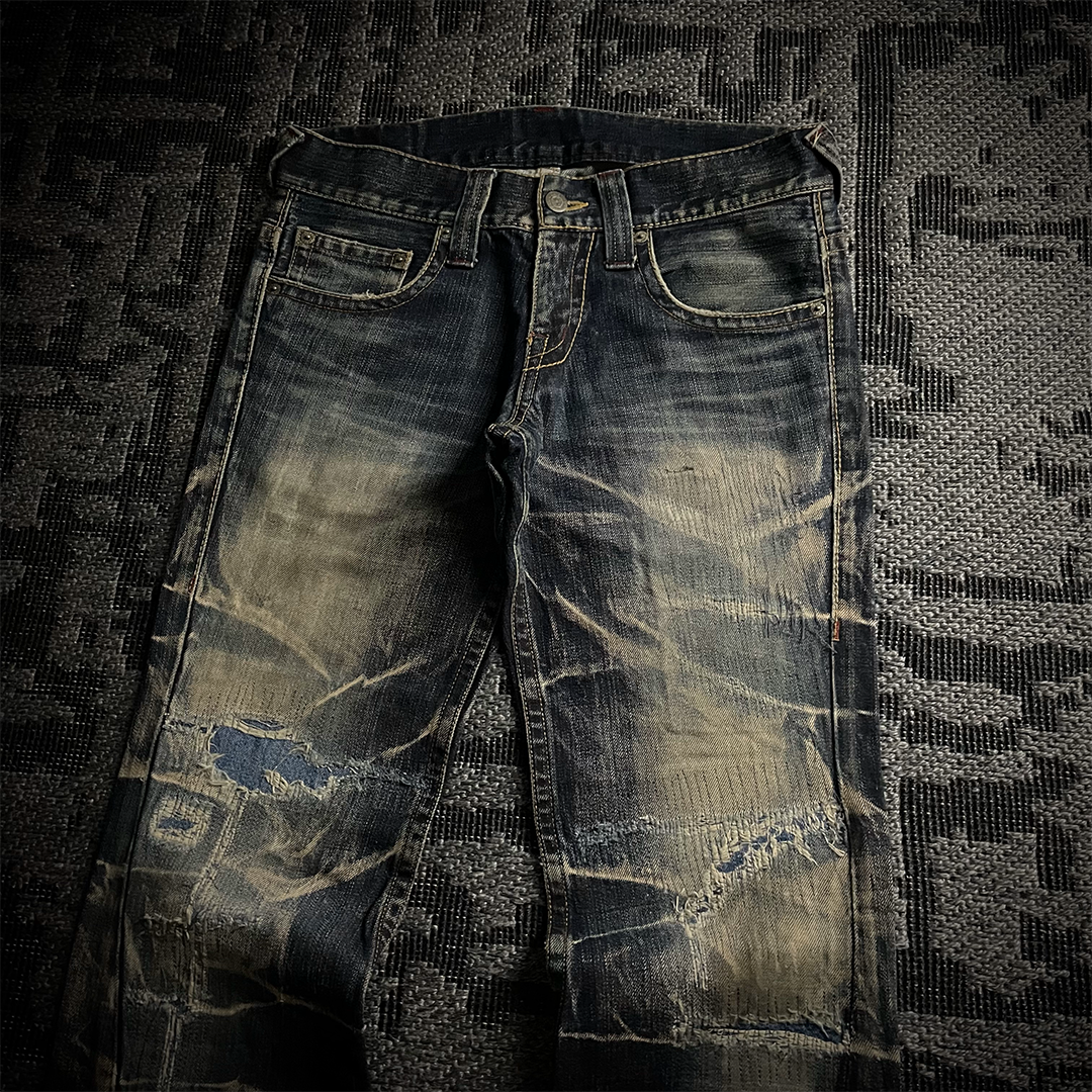 Tornado Mart Distressed Spiral Bootcut Denim