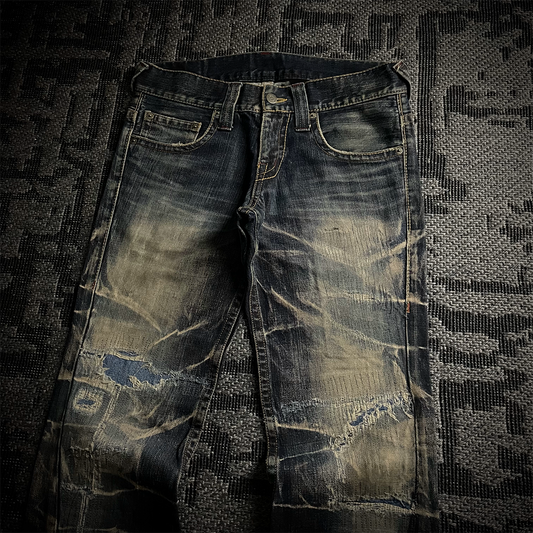 Tornado Mart Distressed Spiral Bootcut Denim