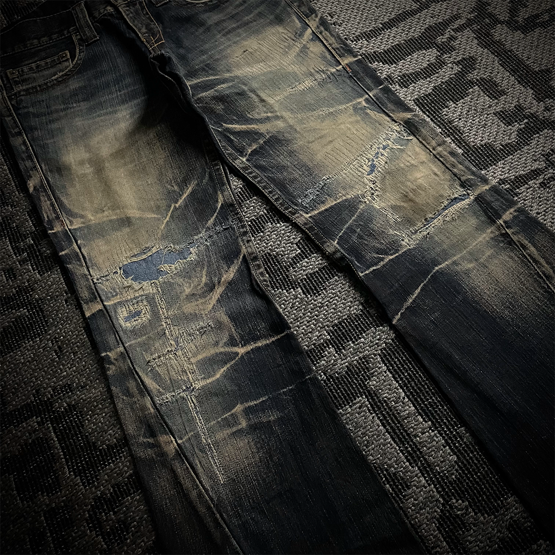 Tornado Mart Distressed Spiral Bootcut Denim