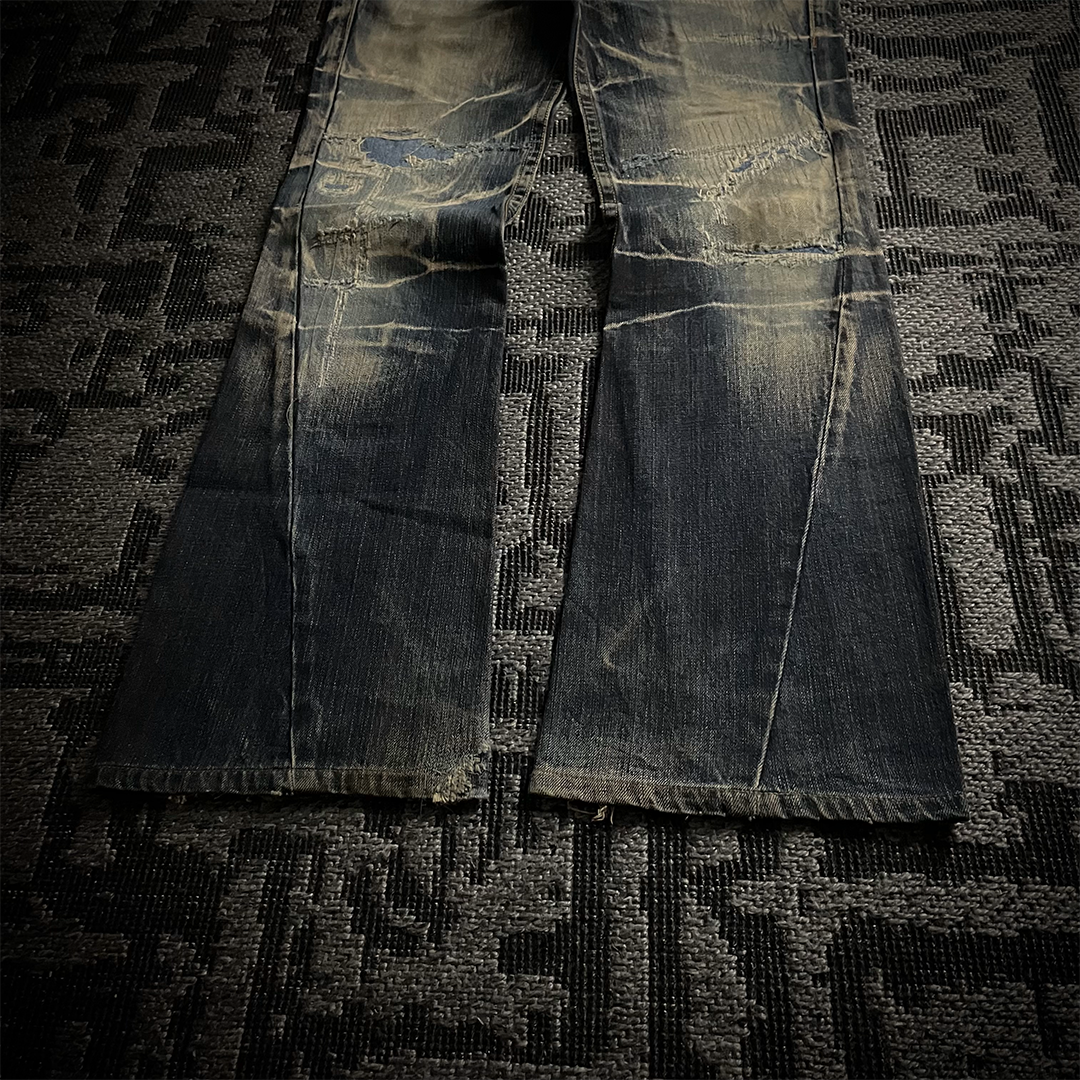 Tornado Mart Distressed Spiral Bootcut Denim