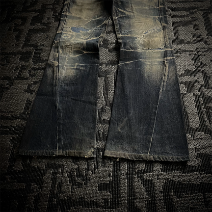 Tornado Mart Distressed Spiral Bootcut Denim