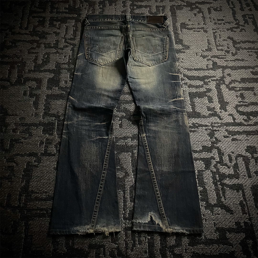 Tornado Mart Distressed Spiral Bootcut Denim