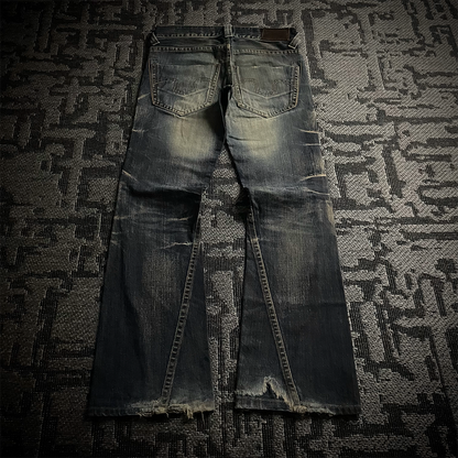 Tornado Mart Distressed Spiral Bootcut Denim