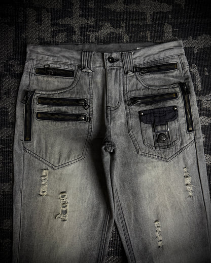 Semantic Design Multi-Zip Distressed Boot Cut Jeans