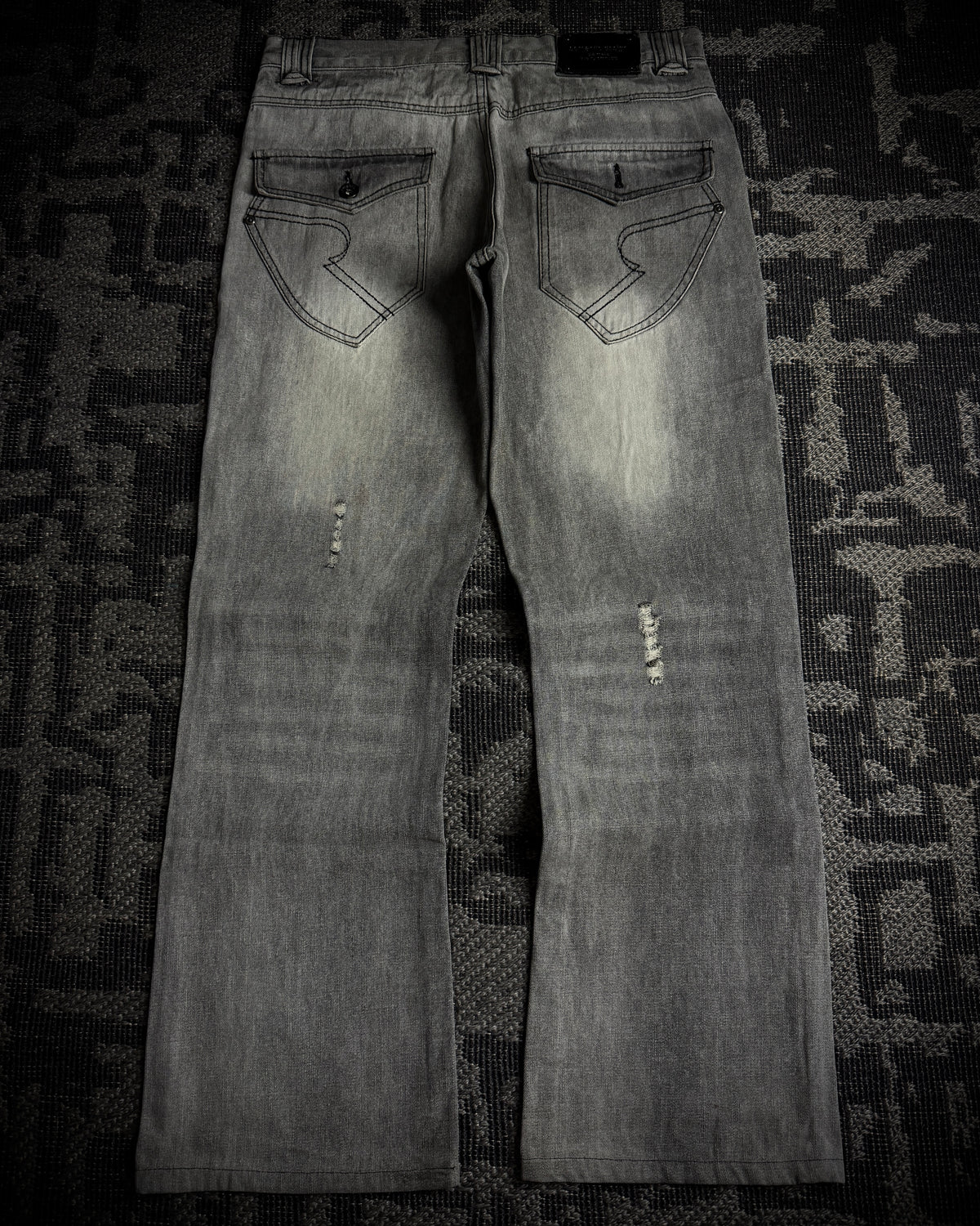 Semantic Design Multi-Zip Distressed Boot Cut Jeans