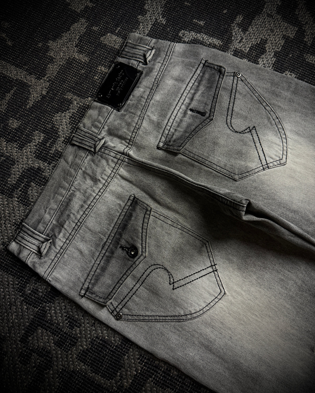 Semantic Design Multi-Zip Distressed Boot Cut Jeans