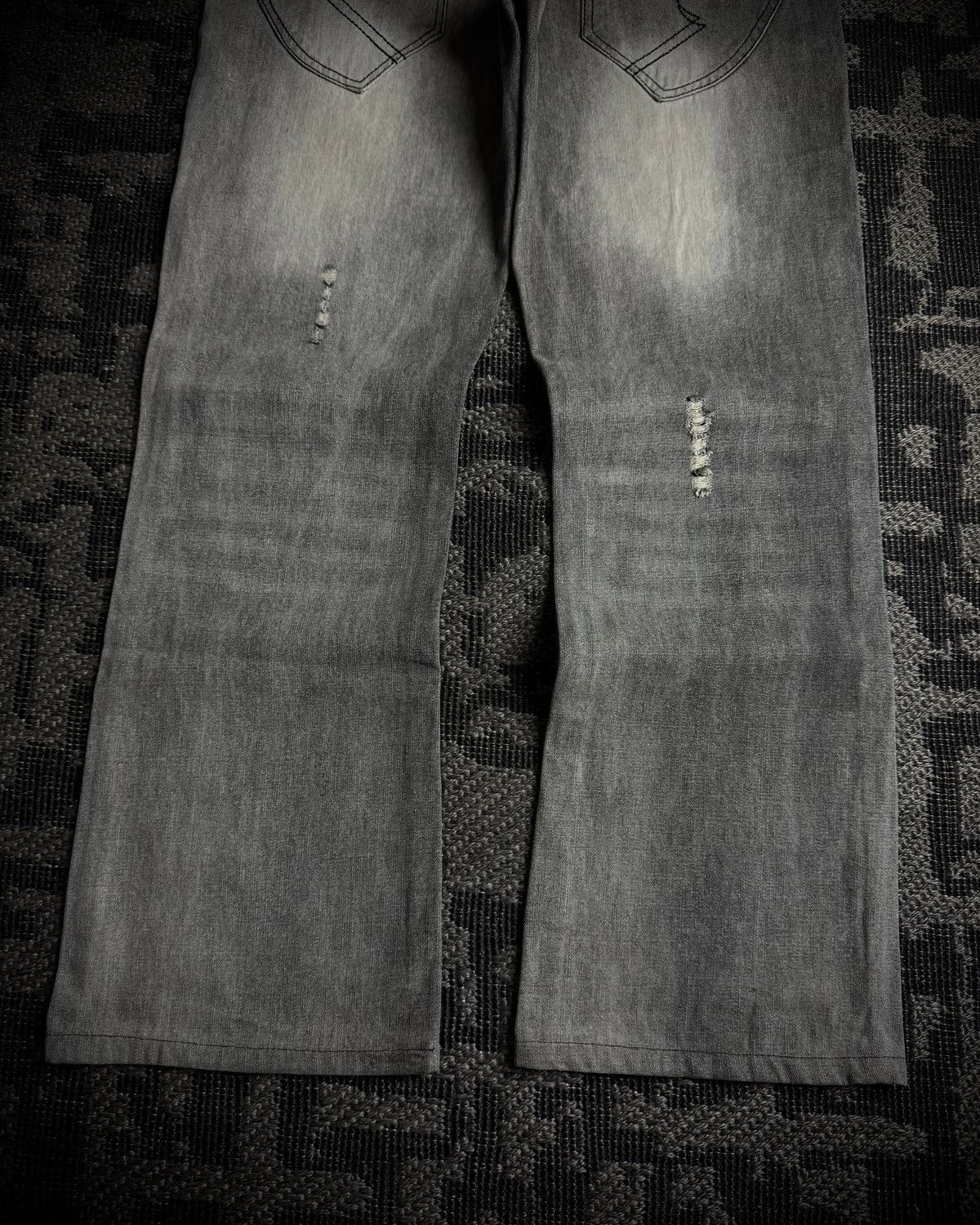 Semantic Design Multi-Zip Distressed Boot Cut Jeans