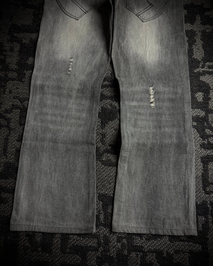 Semantic Design Multi-Zip Distressed Boot Cut Jeans