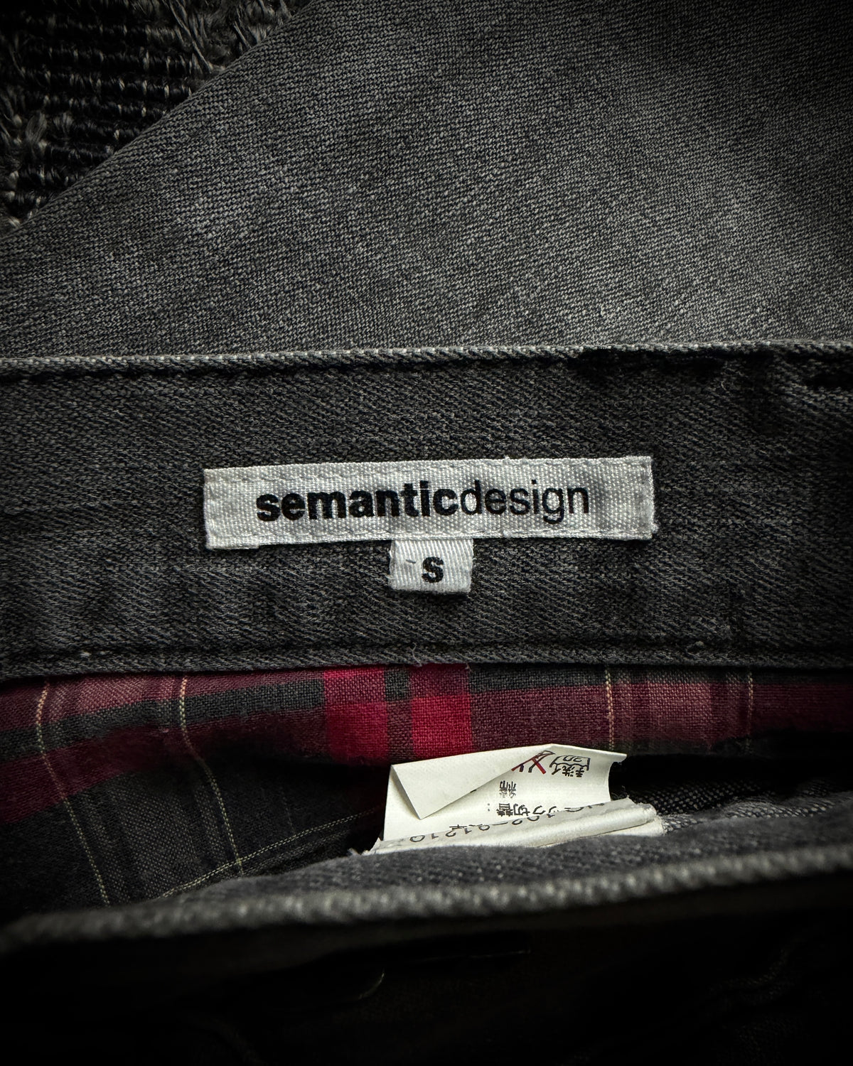 Semantic Design Multi-Zip Distressed Boot Cut Jeans