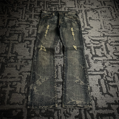 Semantic Design Back Pocket Zipper Distressed Flared Jeans