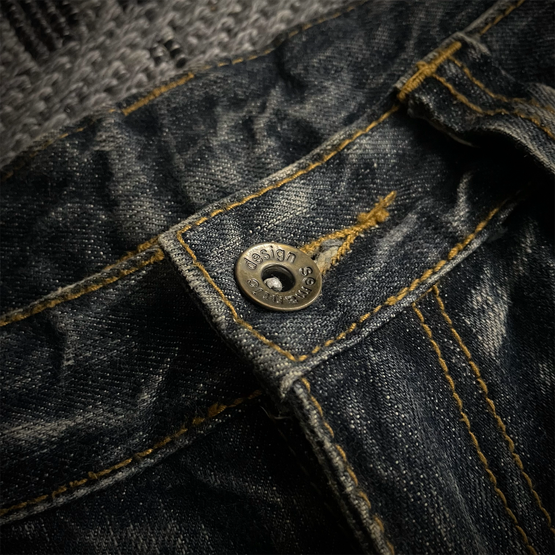 Semantic Design Back Pocket Zipper Distressed Flared Jeans