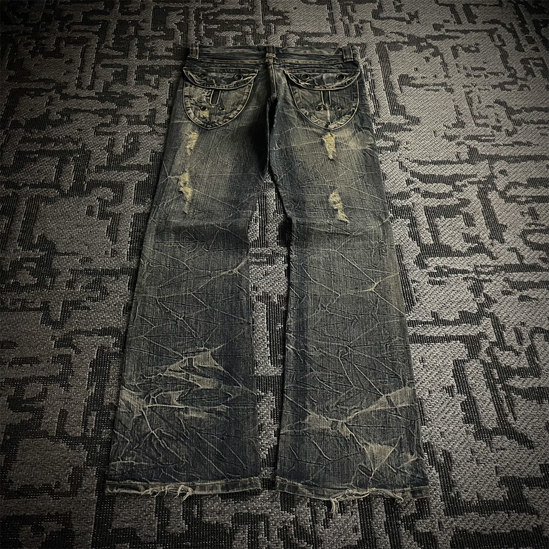 Semantic Design Back Pocket Zipper Distressed Flared Jeans