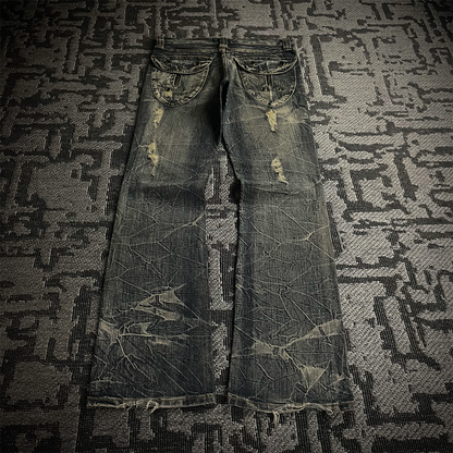 Semantic Design Back Pocket Zipper Distressed Flared Jeans