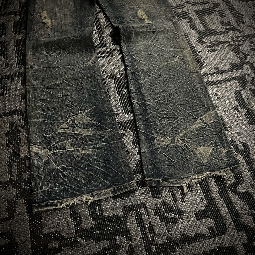 Semantic Design Back Pocket Zipper Distressed Flared Jeans