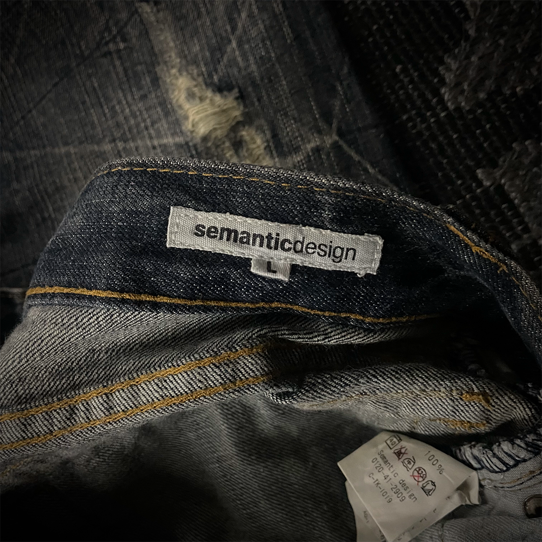 Semantic Design Back Pocket Zipper Distressed Flared Jeans