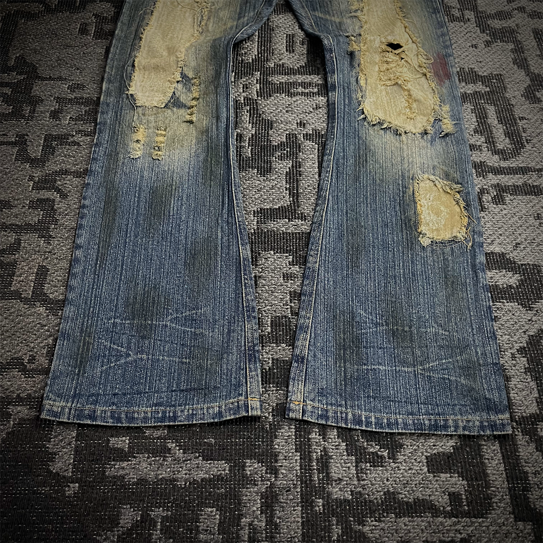 In The Attic Rare Distressed Dirty Flare Denim