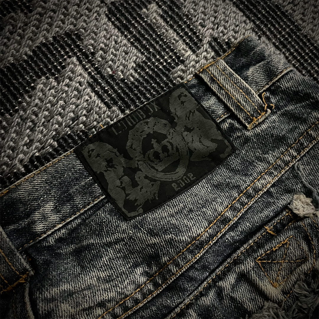 Lowbox Multi-pocket Distressed Flared Jeans