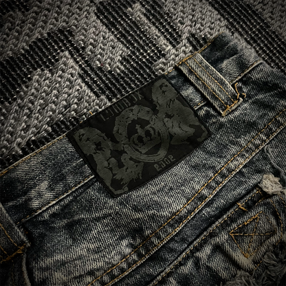 Lowbox Multi-pocket Distressed Flared Jeans