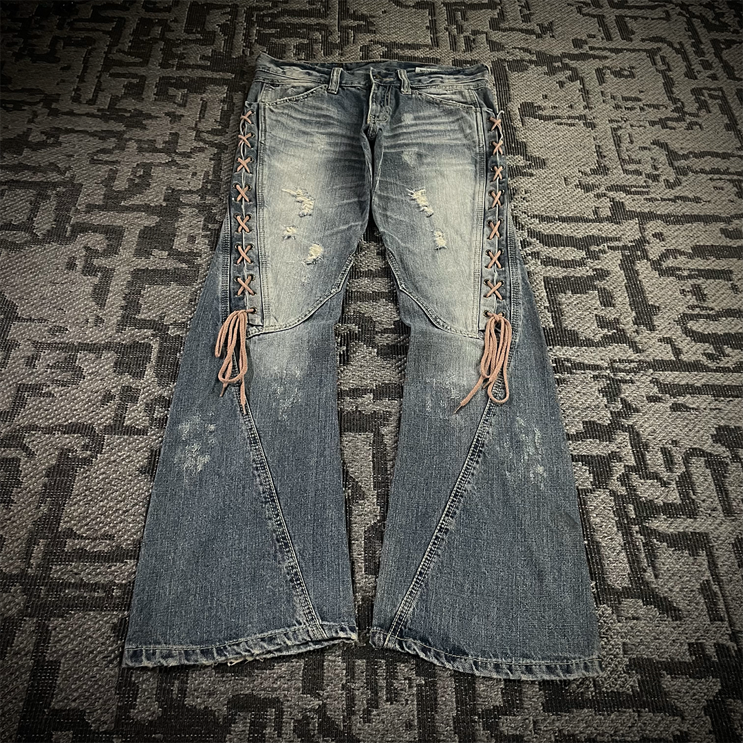 Semantic Design Thigh Lace-Up Spiral Cut Flared Jeans