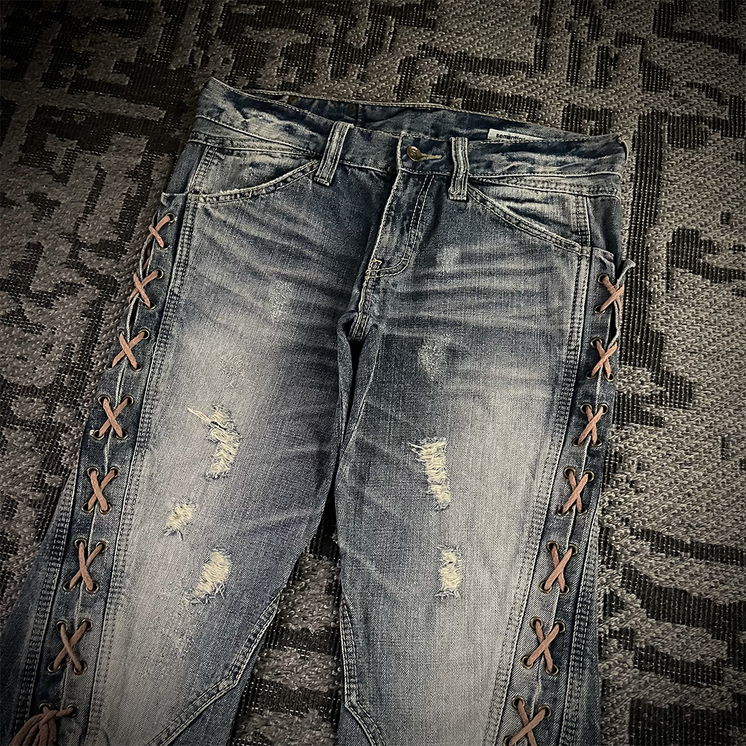 Semantic Design Thigh Lace-Up Spiral Cut Flared Jeans