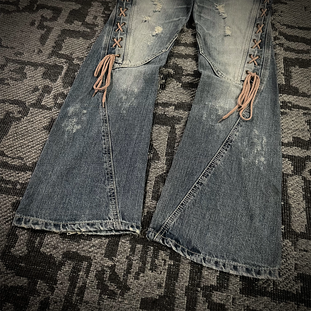 Semantic Design Thigh Lace-Up Spiral Cut Flared Jeans