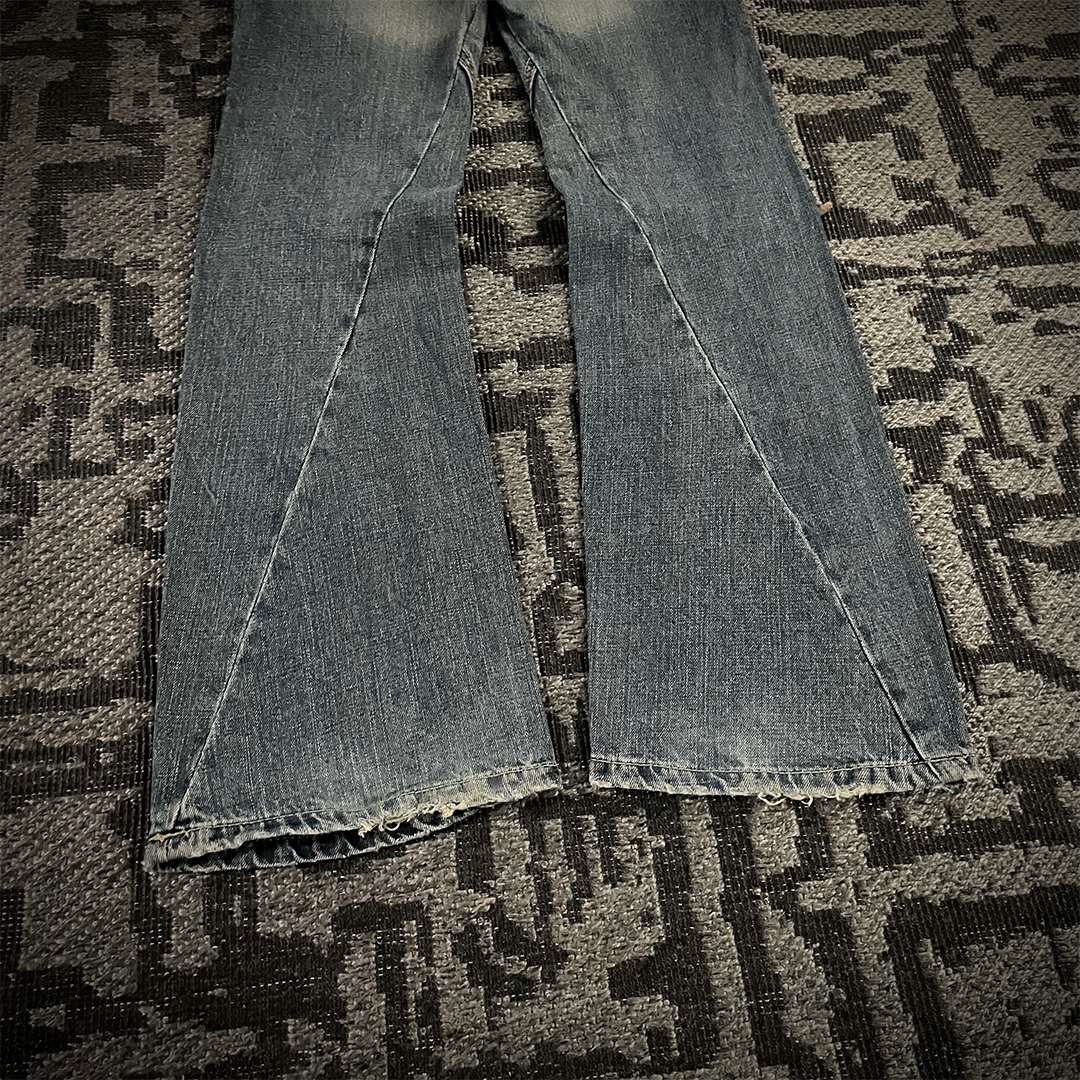 Semantic Design Thigh Lace-Up Spiral Cut Flared Jeans