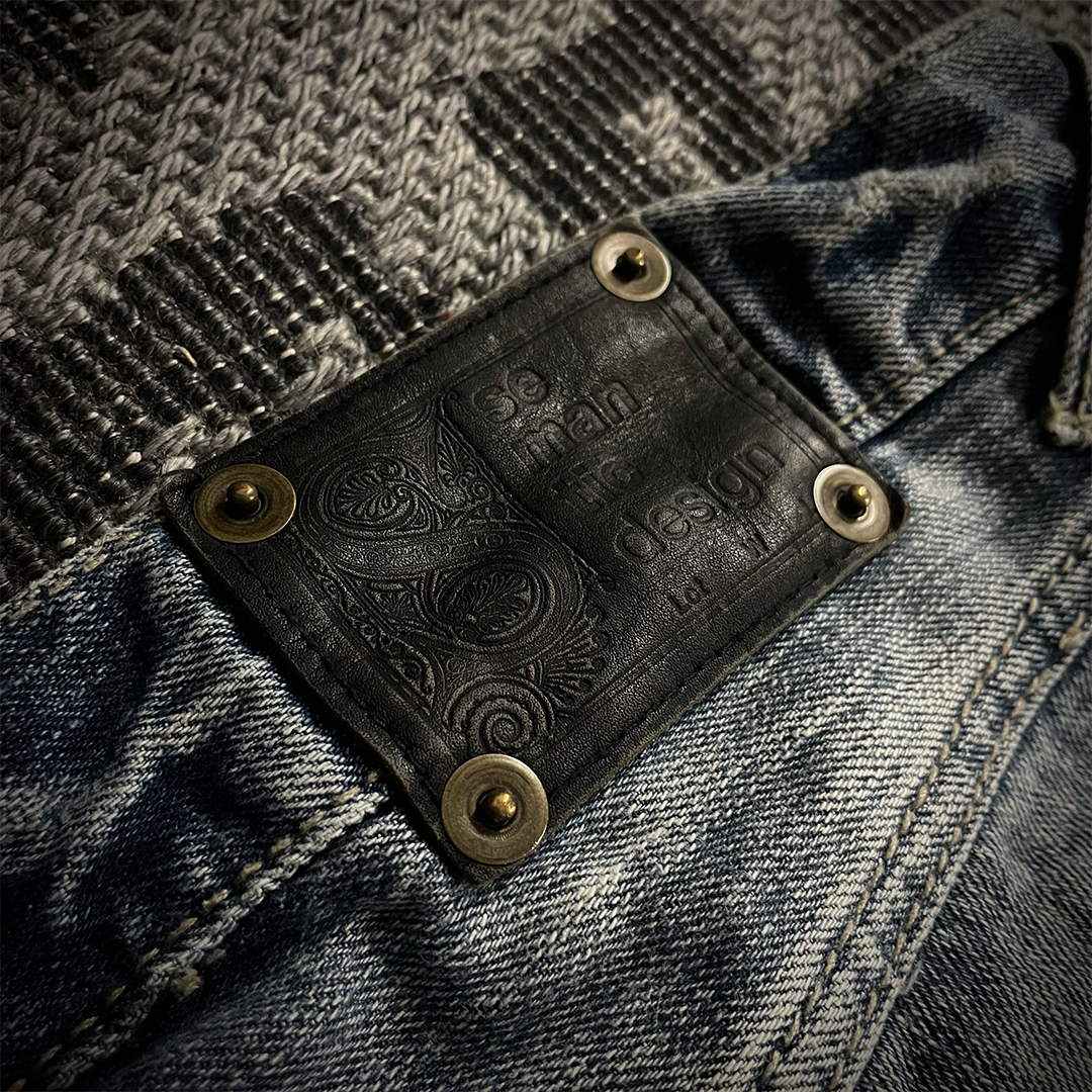 Semantic Design Thigh Lace-Up Spiral Cut Flared Jeans