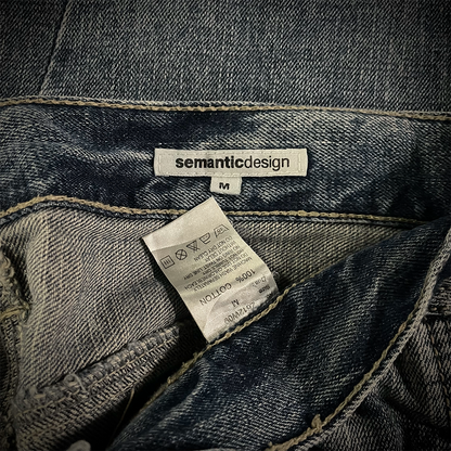 Semantic Design Thigh Lace-Up Spiral Cut Flared Jeans