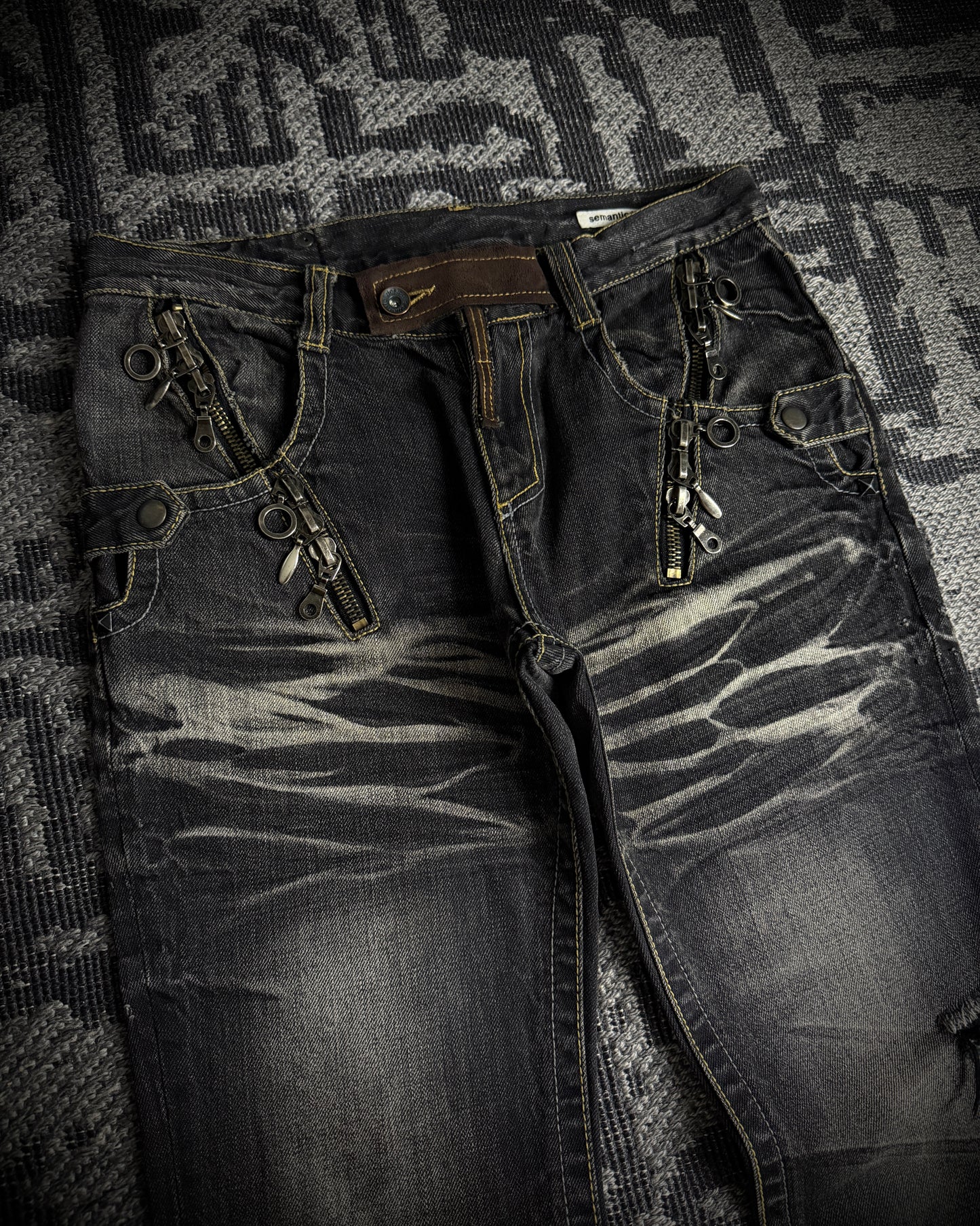 Semantic Design Multi Zip Distressed Bootcut Denim