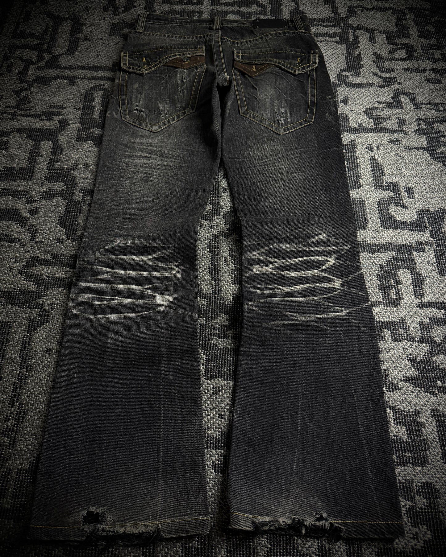 Semantic Design Multi Zip Distressed Bootcut Denim