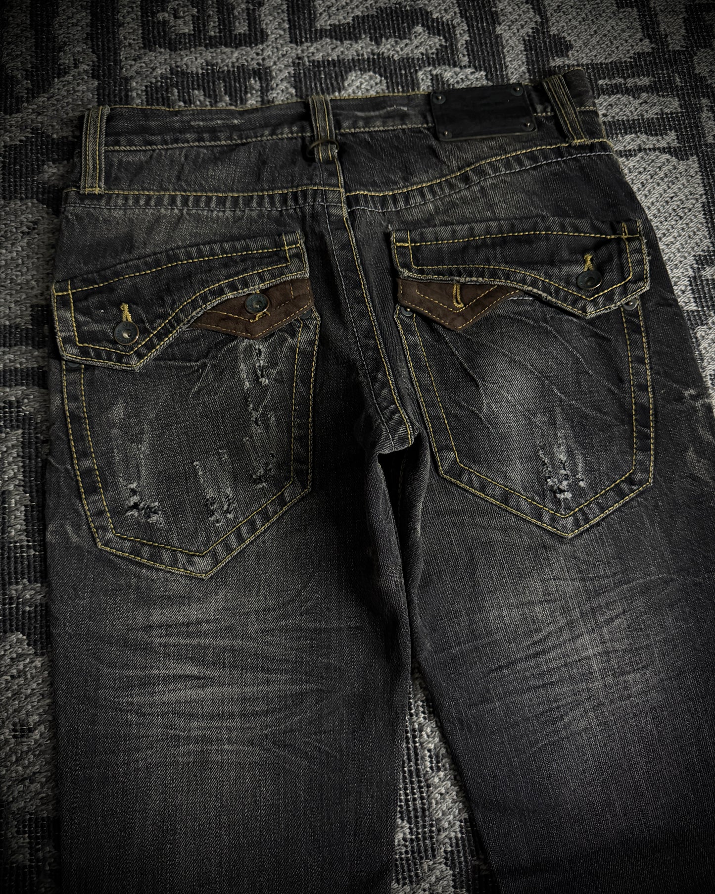 Semantic Design Multi Zip Distressed Bootcut Denim