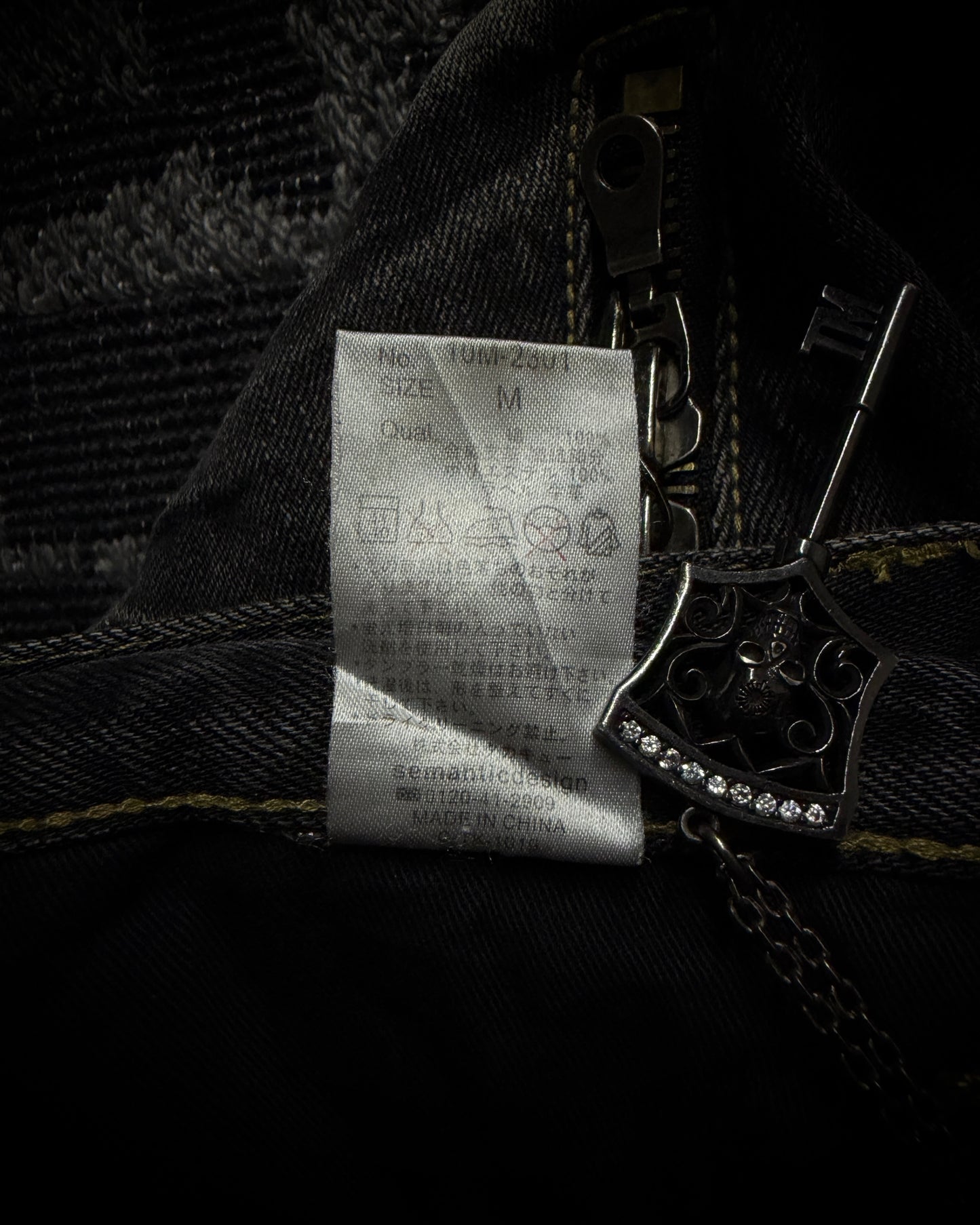 Semantic Design Multi Zip Distressed Bootcut Denim