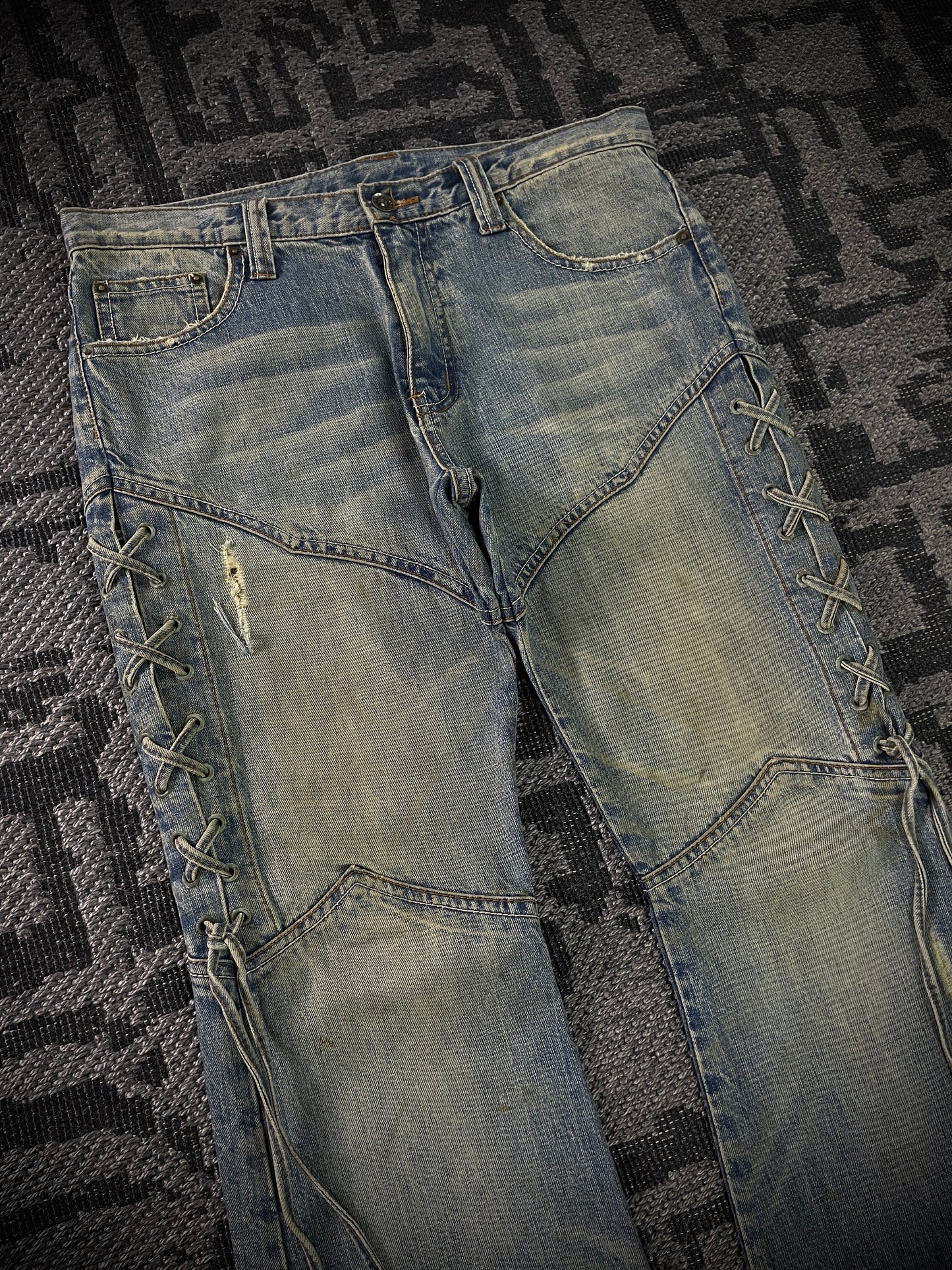 Semantic Design Thigh Lace-Up Flared Jeans