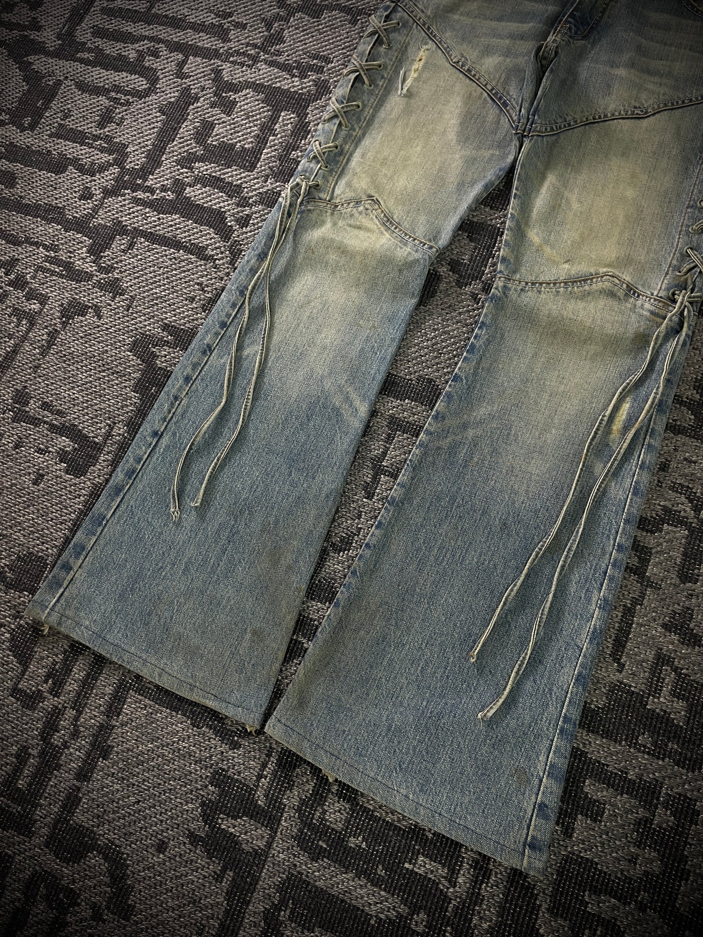 Semantic Design Thigh Lace-Up Flared Jeans