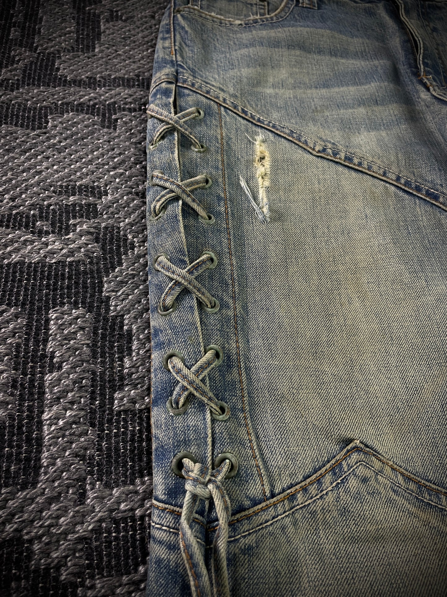 Semantic Design Thigh Lace-Up Flared Jeans