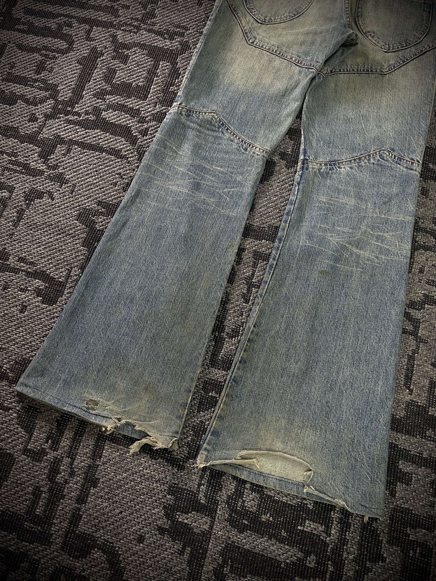 Semantic Design Thigh Lace-Up Flared Jeans