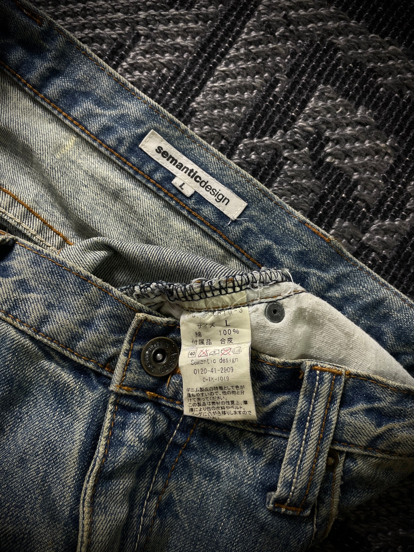 Semantic Design Thigh Lace-Up Flared Jeans