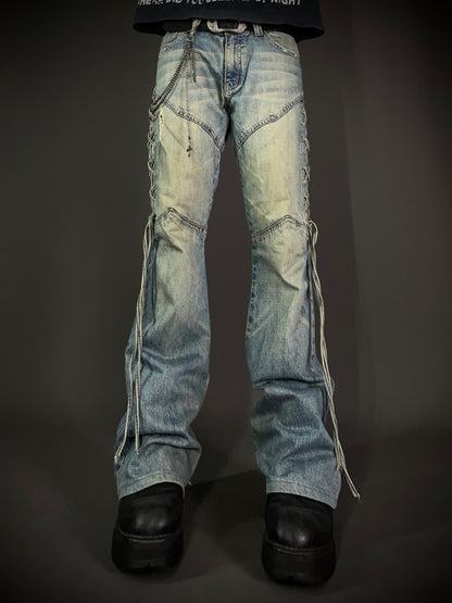 Semantic Design Thigh Lace-Up Flared Jeans