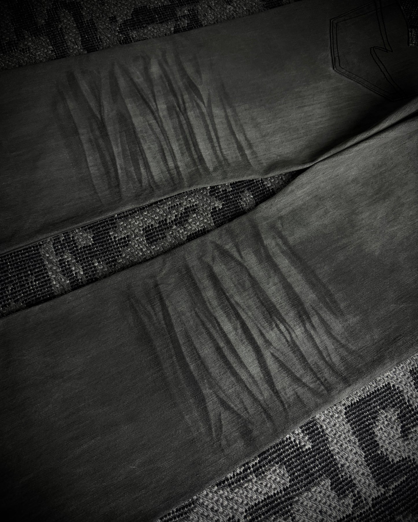 Semantic Design Snakeskin Black Whiskered Smoke Gray Flared Jeans