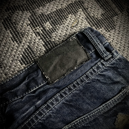 FUGA Whiskered Faded Distressed Flared Jeans