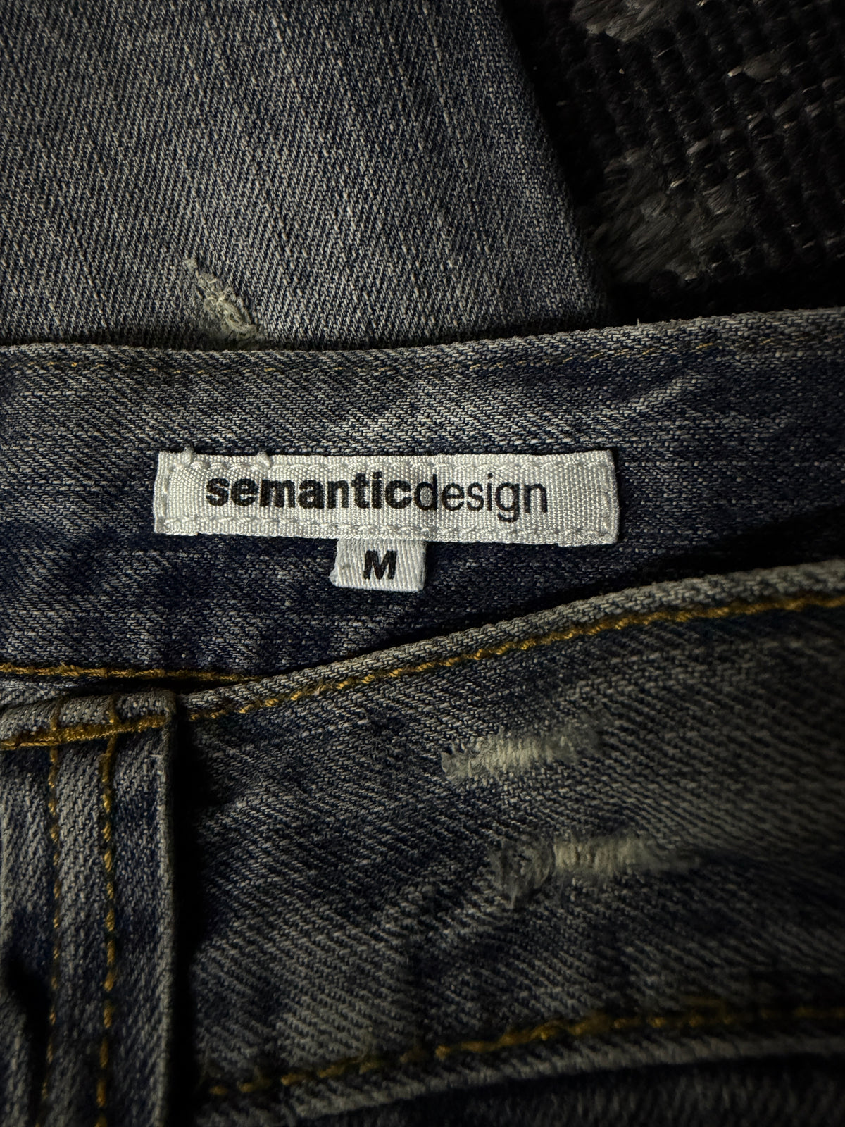Semantic Design Faded Cracked Bootcut Jeans