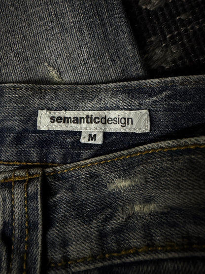 Semantic Design Faded Cracked Bootcut Jeans