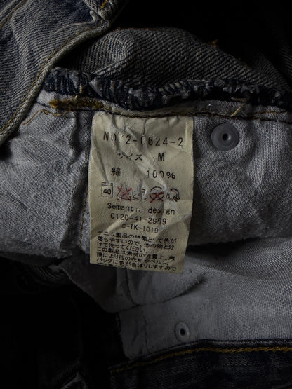 Semantic Design Faded Cracked Bootcut Jeans