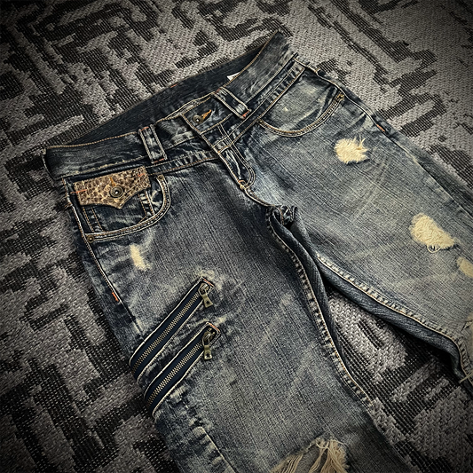 Semantic Design Snake Skin Distressed Flared Jeans